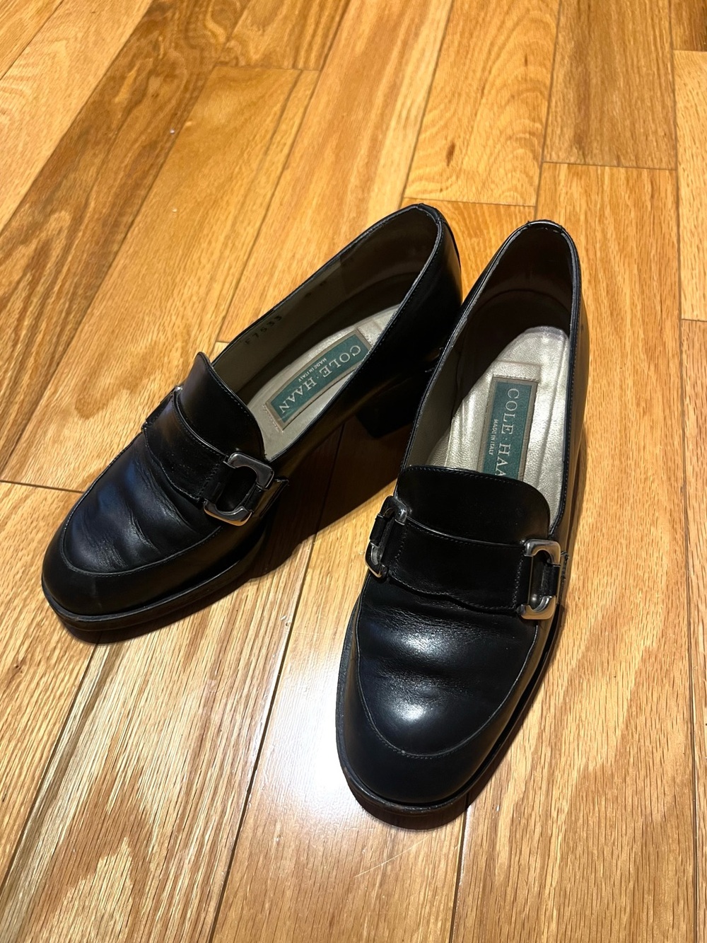 Cole Haan Black Leather Loafers with Silver Buckle Detail
